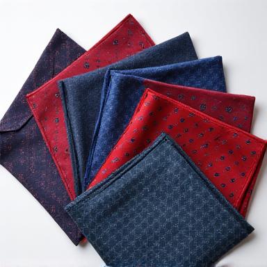 Neatly folded patterned pocket squares in vibrant colors